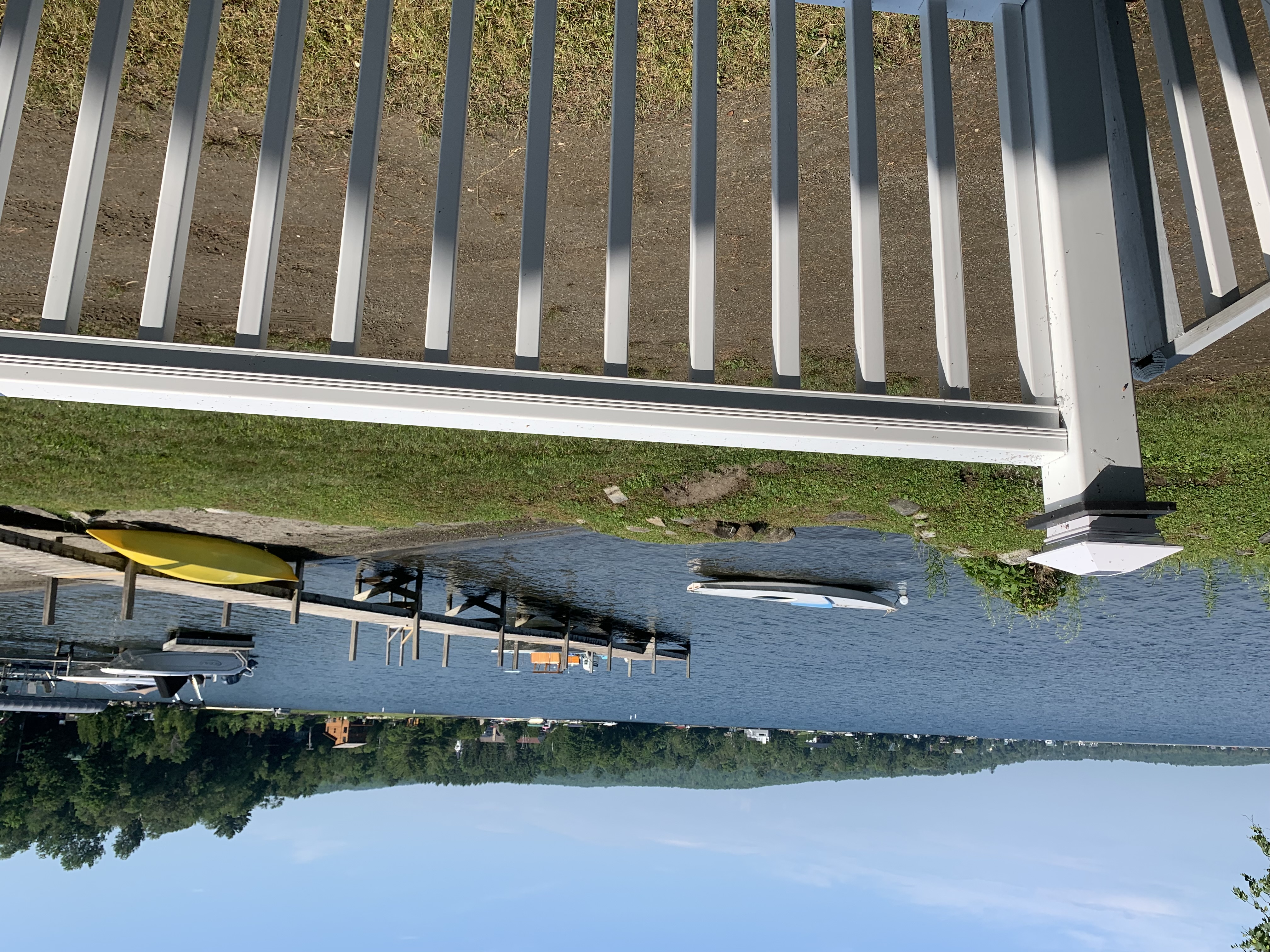 Well cared for cottages are next to the lake's sandy shore.