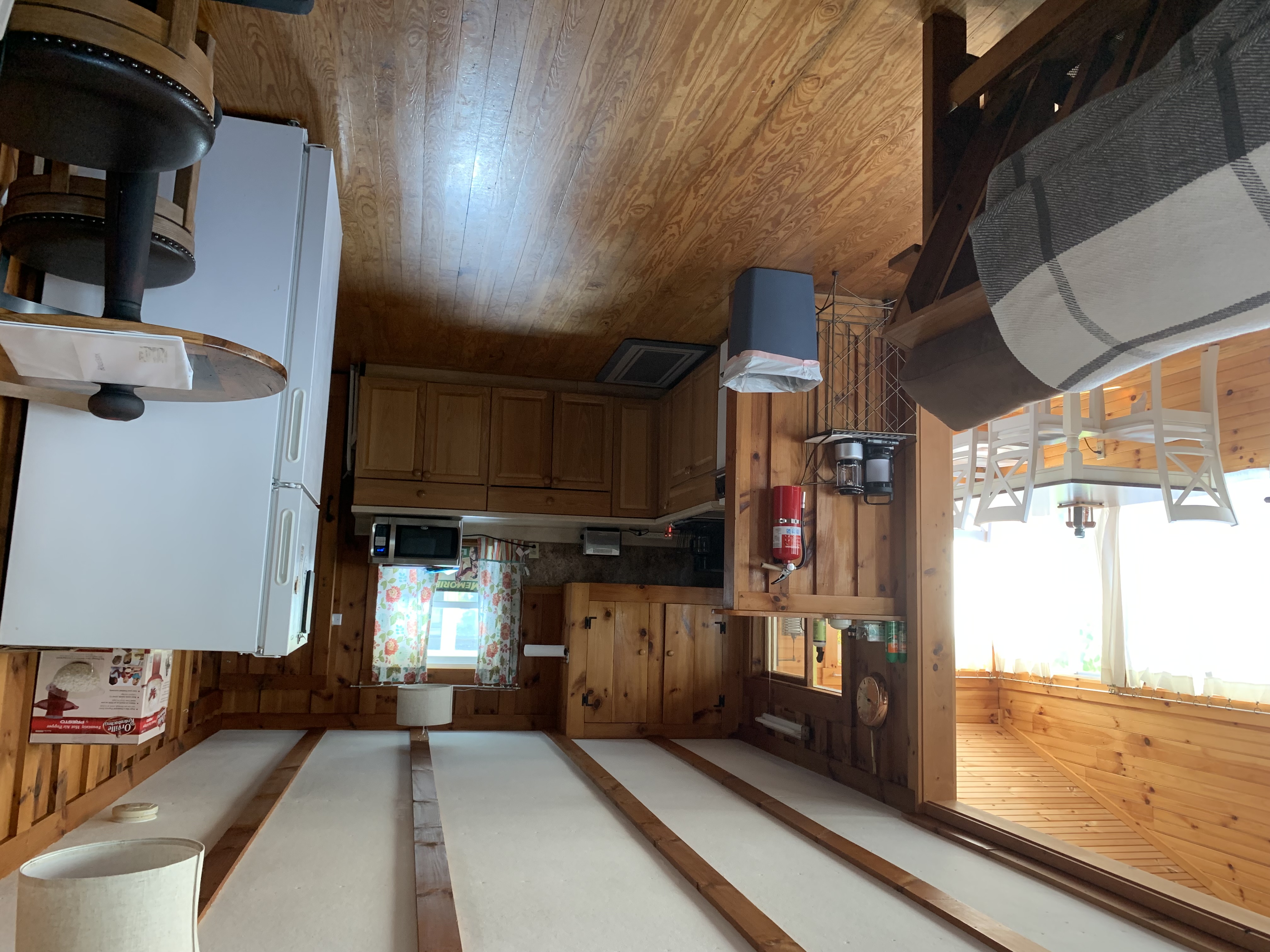 Cook your favorite meals in this  country kitchen complete with full size appliances and cooking accoutrements.