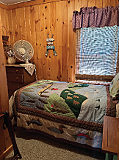 Country sleeping accommodations include charming decor.