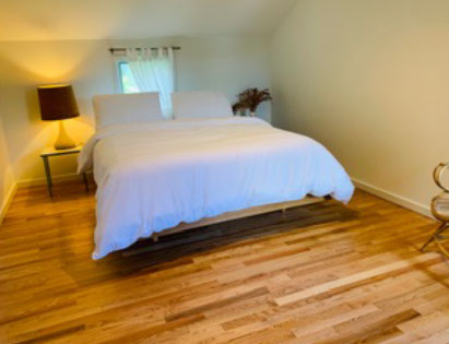 A master bedroom with extra space is included.