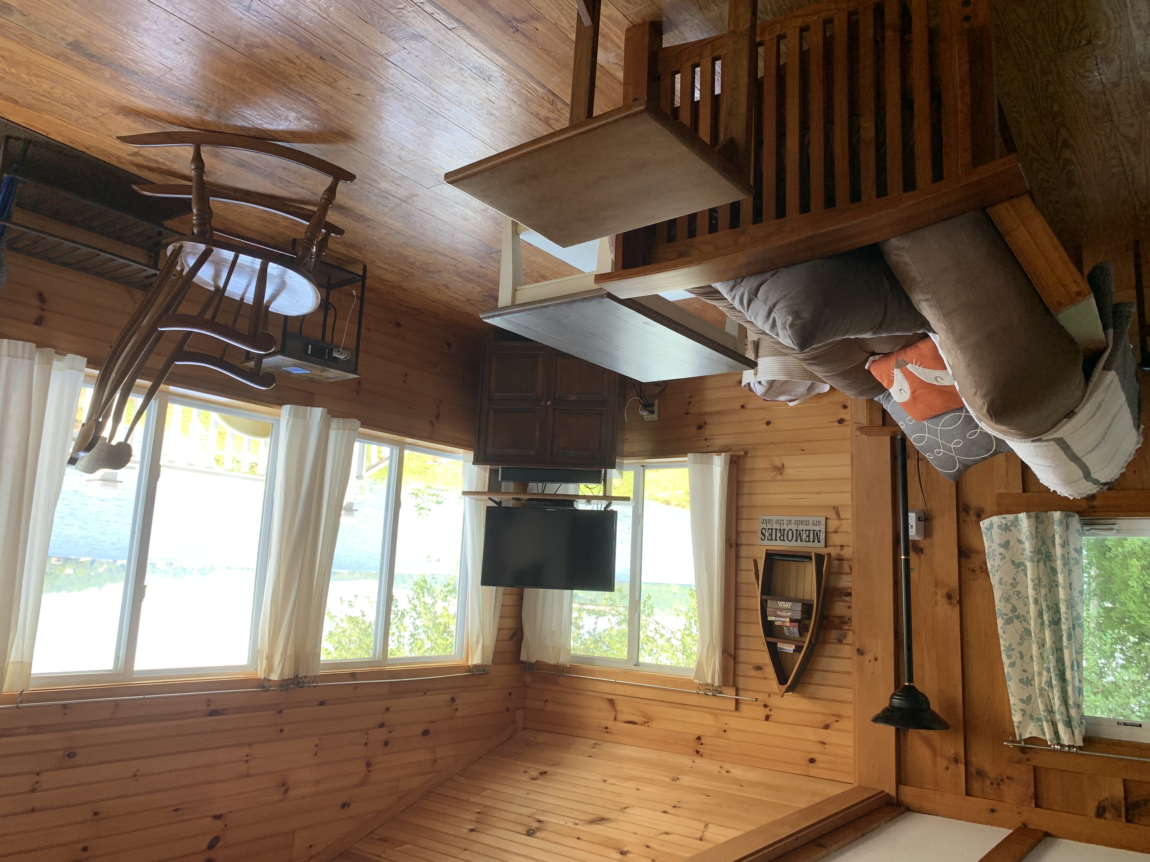 Enjoy water views from this cozy living room.